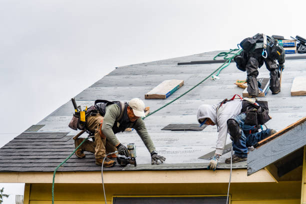 Professional Gutter Installation technician working in Johnson, VT